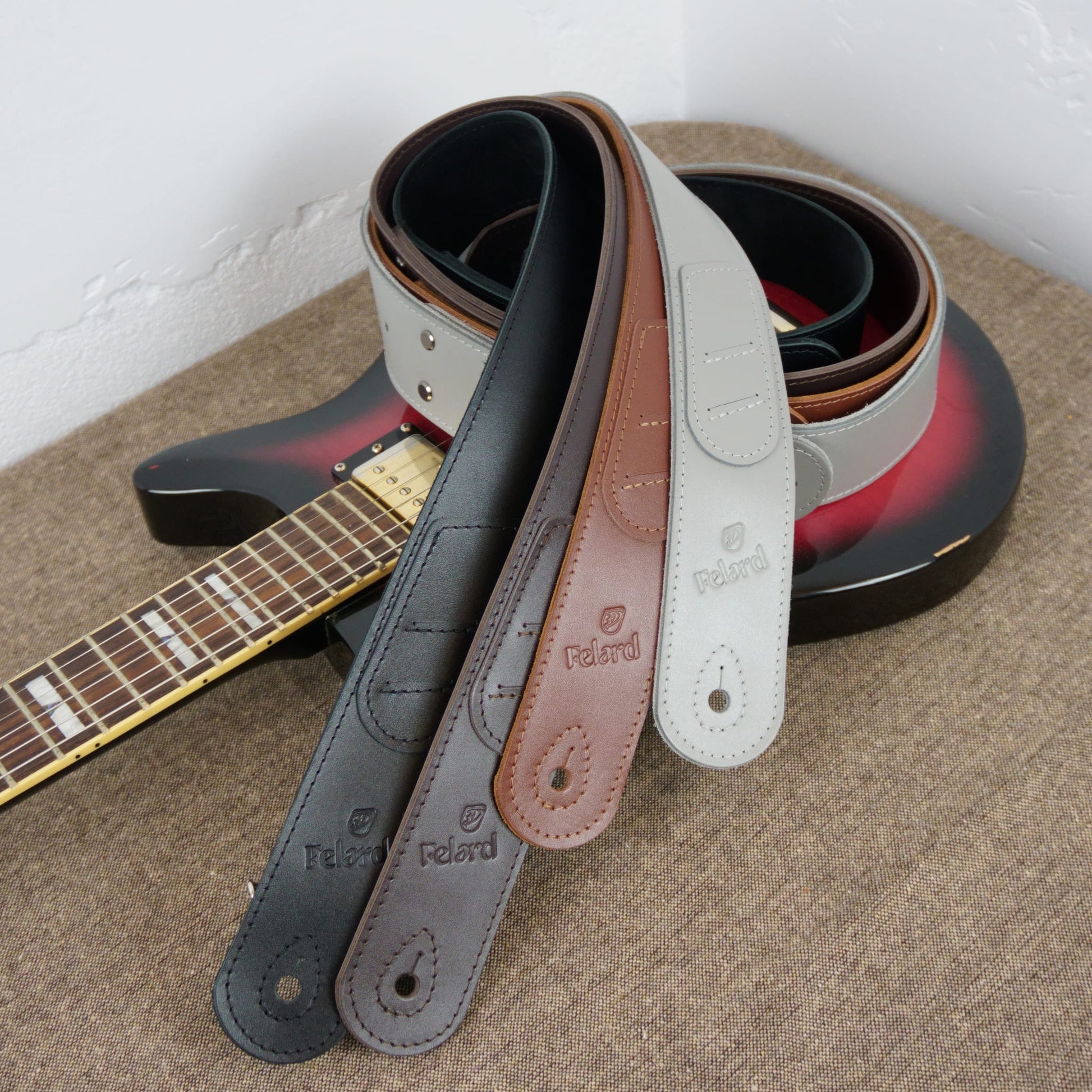 Custom leather guitar strap available in multiple color variations