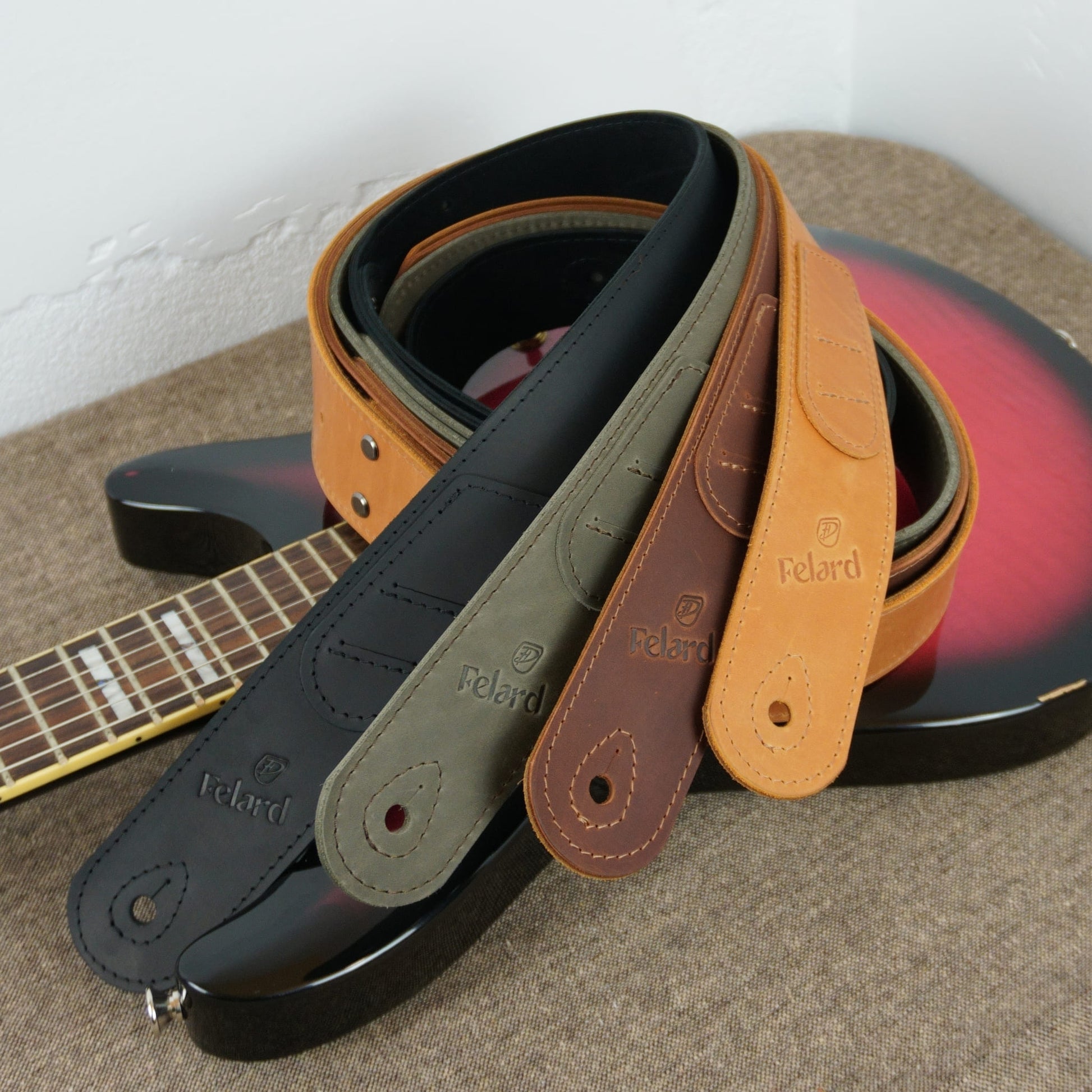 Adjustable leather guitar straps available in multiple leather colors